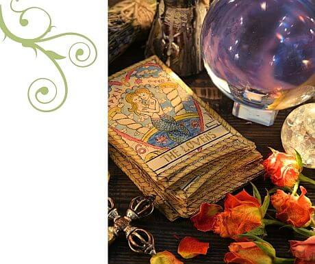 tarot cards, rose petals on table
